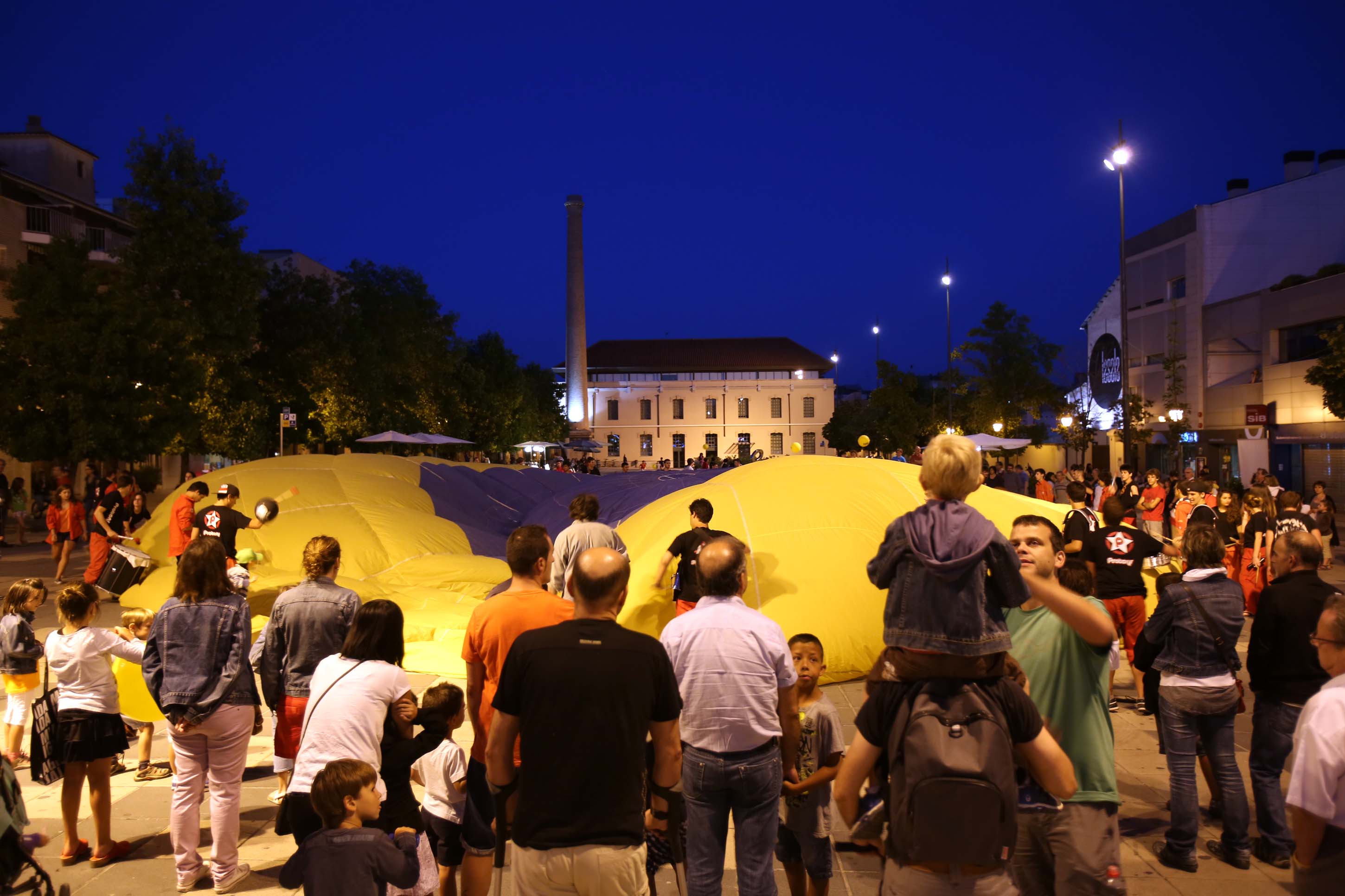 A Wind Igloo illuminated during a festival